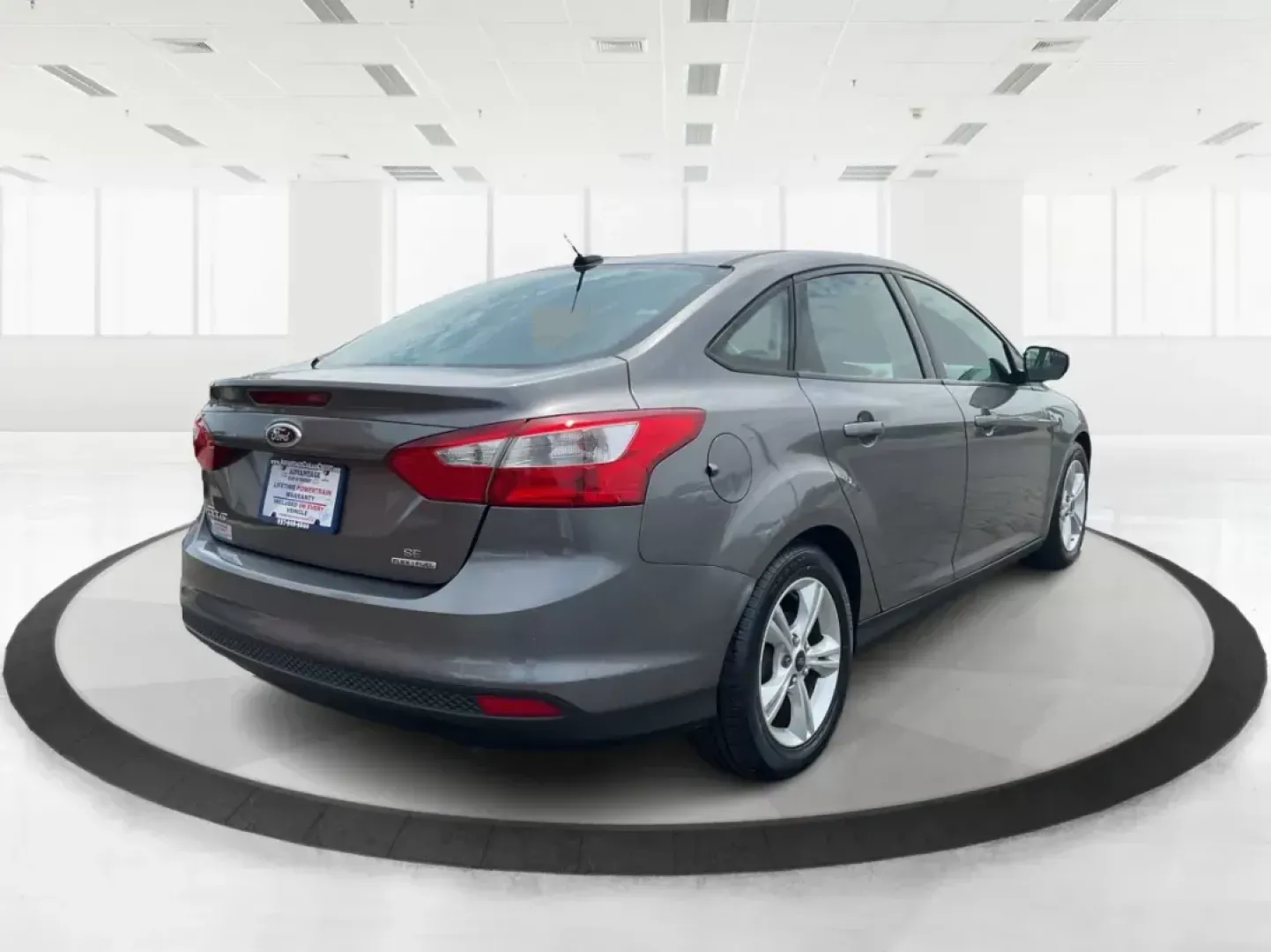 2014 Ford Focus SE (1FADP3F21EL) with an 2L I-4 gasoline direct injection engine, located at 1099 N County Rd 25A , Troy, OH, 45373, (937) 908-9800, 40.057041, -84.215462 - Photo#2