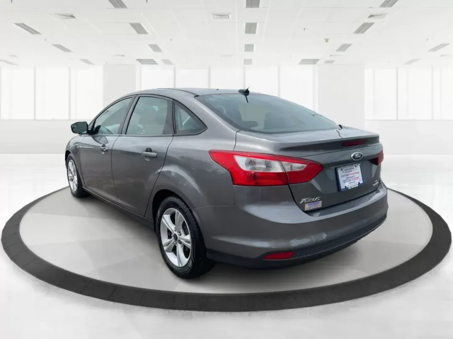 2014 Ford Focus SE (1FADP3F21EL) with an 2L I-4 gasoline direct injection engine, located at 1099 N County Rd 25A , Troy, OH, 45373, (937) 908-9800, 40.057041, -84.215462 - Photo#4