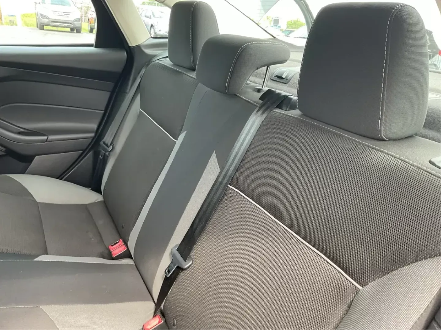 2014 Ford Focus SE (1FADP3F21EL) with an 2L I-4 gasoline direct injection engine, located at 1099 N County Rd 25A , Troy, OH, 45373, (937) 908-9800, 40.057041, -84.215462 - Photo#9