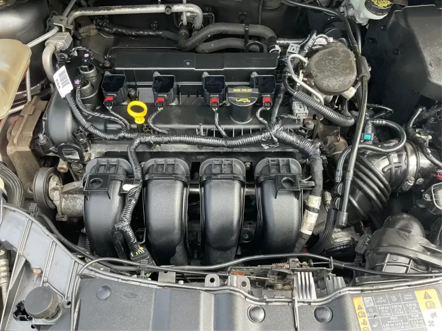 2014 Ford Focus SE (1FADP3F21EL) with an 2L I-4 gasoline direct injection engine, located at 1099 N County Rd 25A , Troy, OH, 45373, (937) 908-9800, 40.057041, -84.215462 - Photo#10