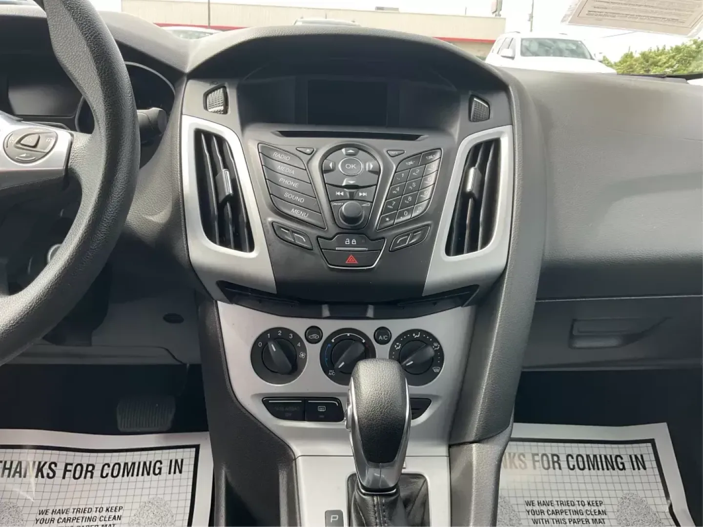 2014 Ford Focus SE (1FADP3F21EL) with an 2L I-4 gasoline direct injection engine, located at 1099 N County Rd 25A , Troy, OH, 45373, (937) 908-9800, 40.057041, -84.215462 - Photo#12