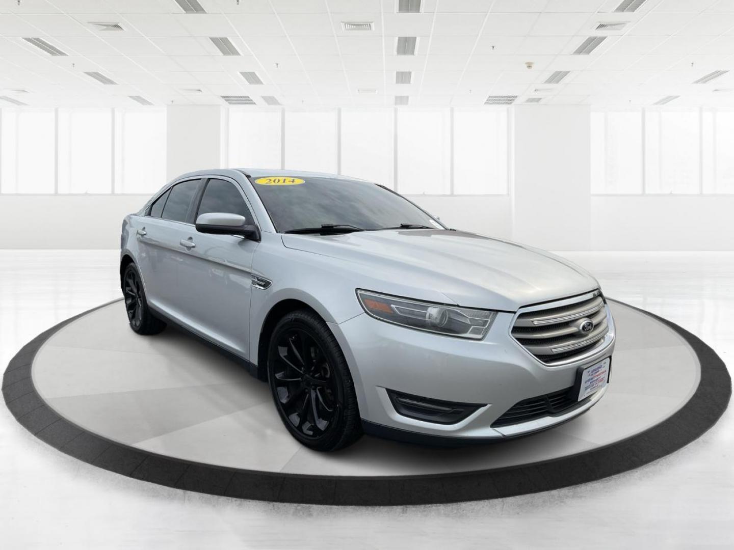2014 Ford Taurus SEL (1FAHP2E86EG) with an EcoBoost 2L I-4 gasoline direct injection engine, located at 1099 N County Rd 25A , Troy, OH, 45373, (937) 908-9800, 40.057041, -84.215462 - Photo#0