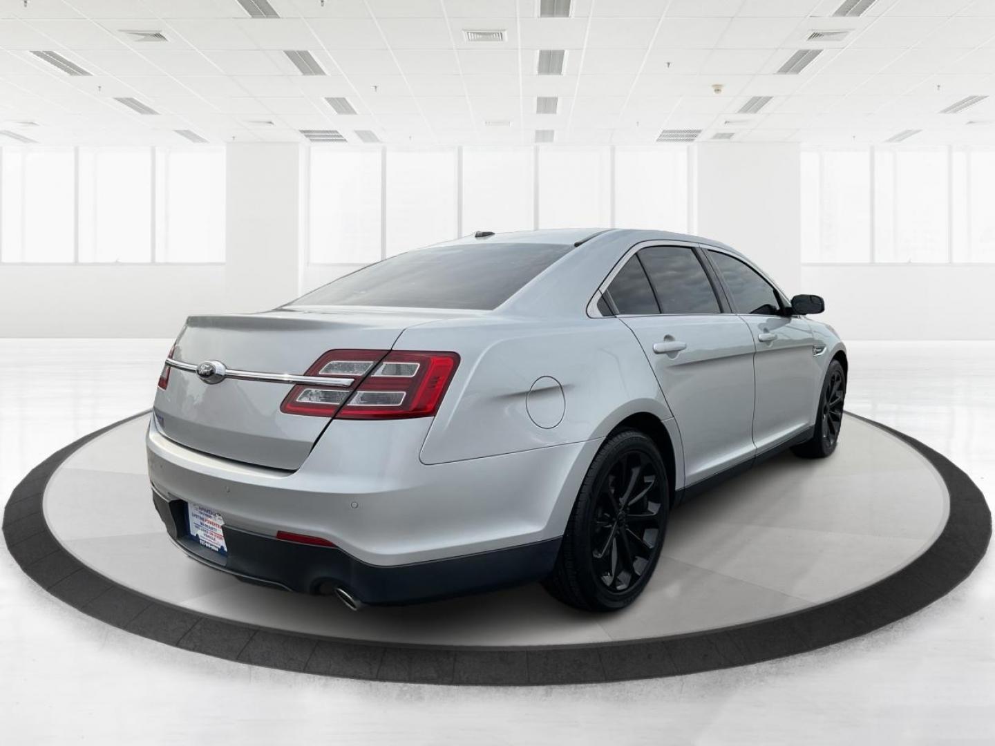 2014 Ford Taurus SEL (1FAHP2E86EG) with an EcoBoost 2L I-4 gasoline direct injection engine, located at 1099 N County Rd 25A , Troy, OH, 45373, (937) 908-9800, 40.057041, -84.215462 - Photo#2