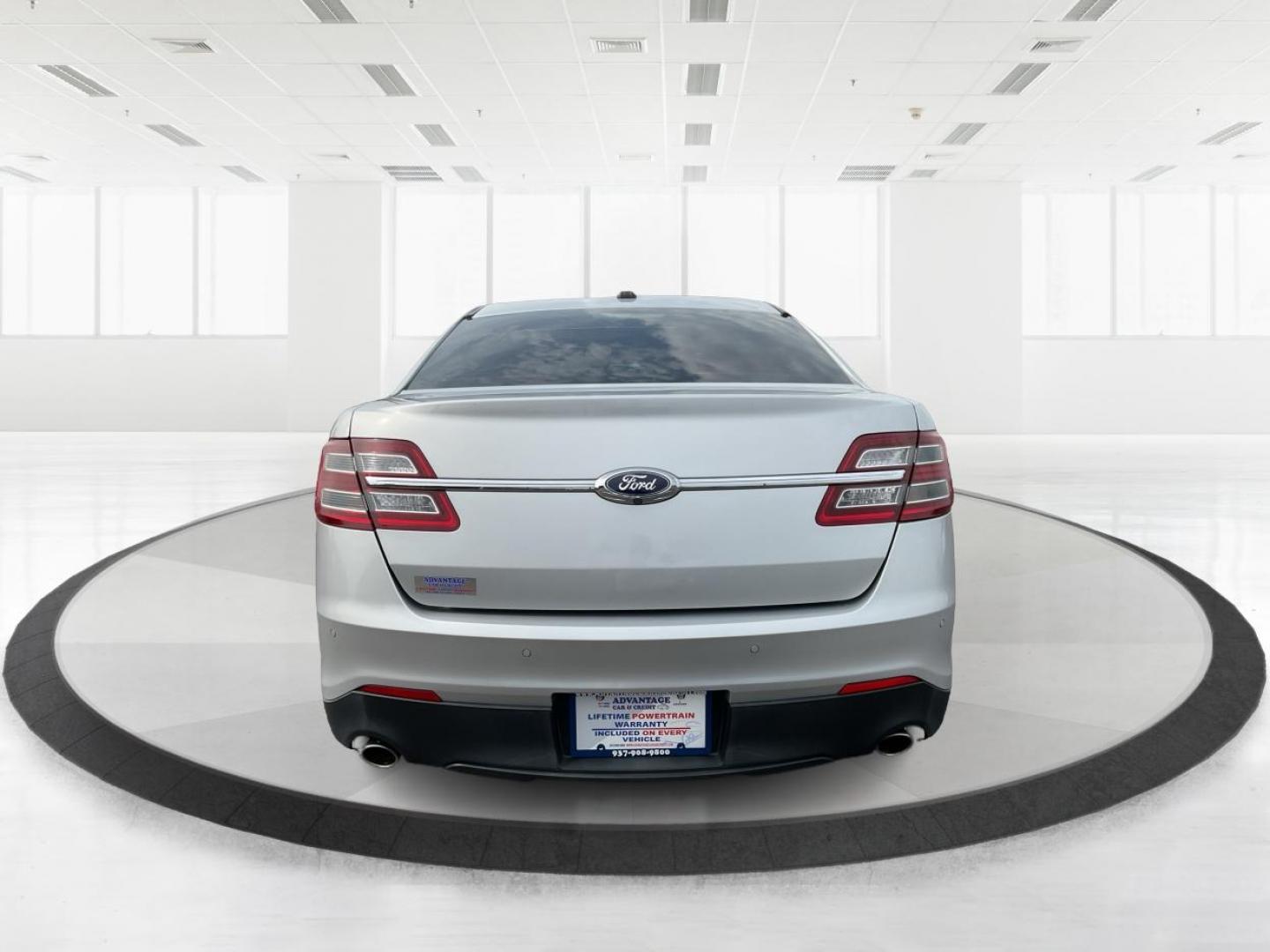 2014 Ford Taurus SEL (1FAHP2E86EG) with an EcoBoost 2L I-4 gasoline direct injection engine, located at 1099 N County Rd 25A , Troy, OH, 45373, (937) 908-9800, 40.057041, -84.215462 - Photo#4