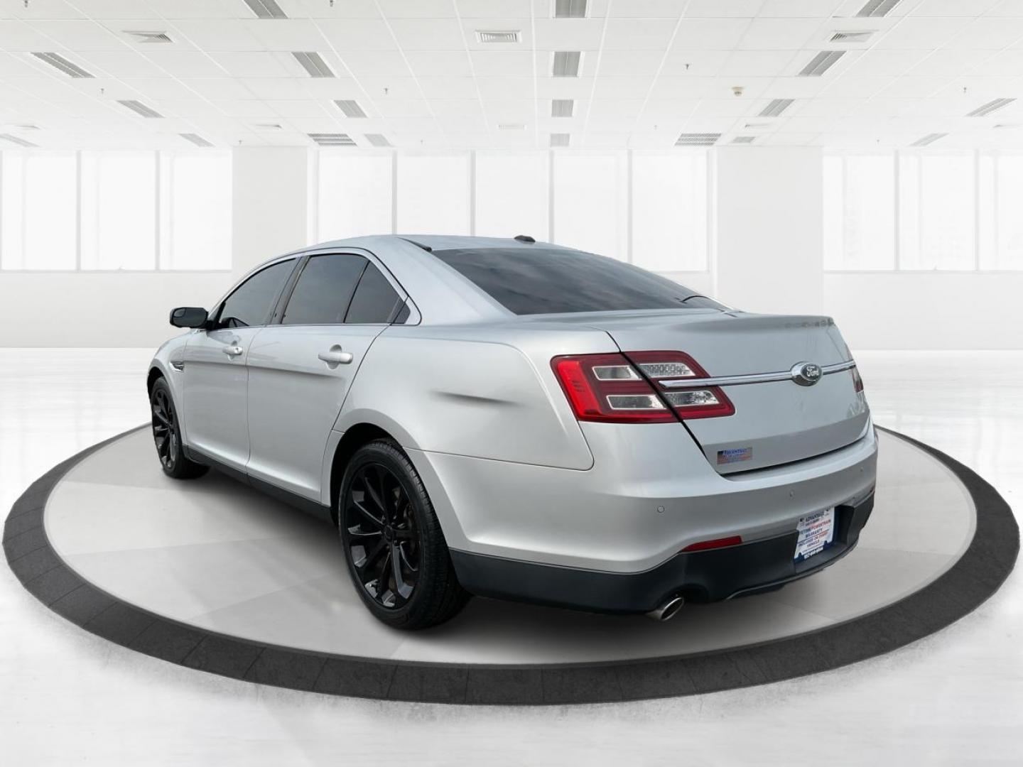 2014 Ford Taurus SEL (1FAHP2E86EG) with an EcoBoost 2L I-4 gasoline direct injection engine, located at 1099 N County Rd 25A , Troy, OH, 45373, (937) 908-9800, 40.057041, -84.215462 - Photo#5