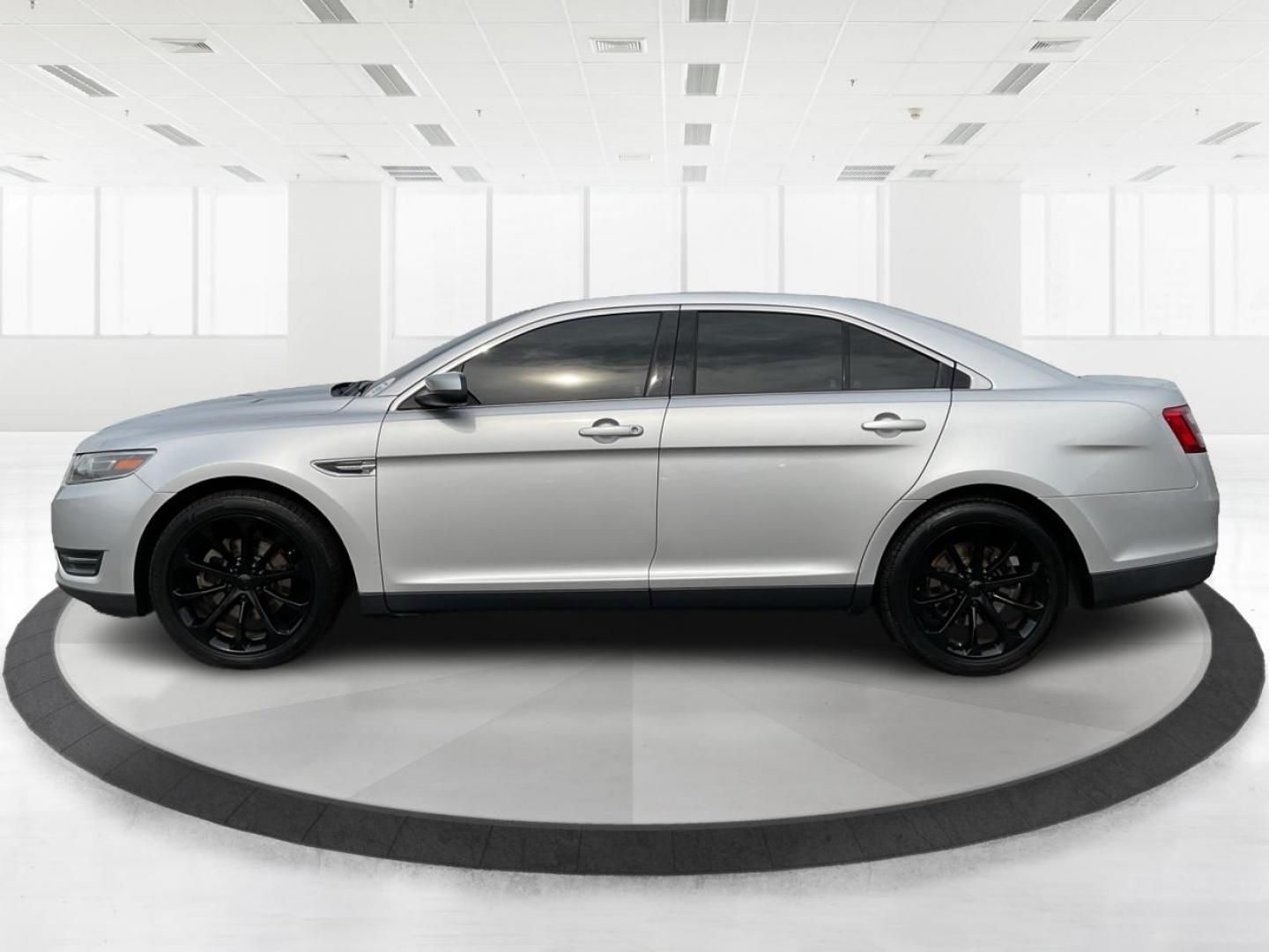 2014 Ford Taurus SEL (1FAHP2E86EG) with an EcoBoost 2L I-4 gasoline direct injection engine, located at 1099 N County Rd 25A , Troy, OH, 45373, (937) 908-9800, 40.057041, -84.215462 - Photo#6