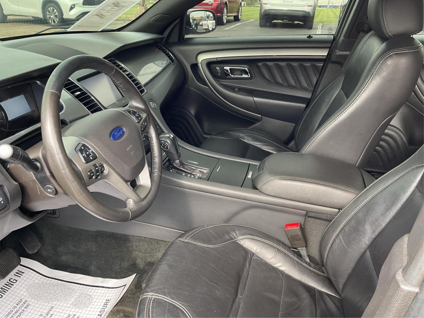 2014 Ford Taurus SEL (1FAHP2E86EG) with an EcoBoost 2L I-4 gasoline direct injection engine, located at 1099 N County Rd 25A , Troy, OH, 45373, (937) 908-9800, 40.057041, -84.215462 - Photo#9