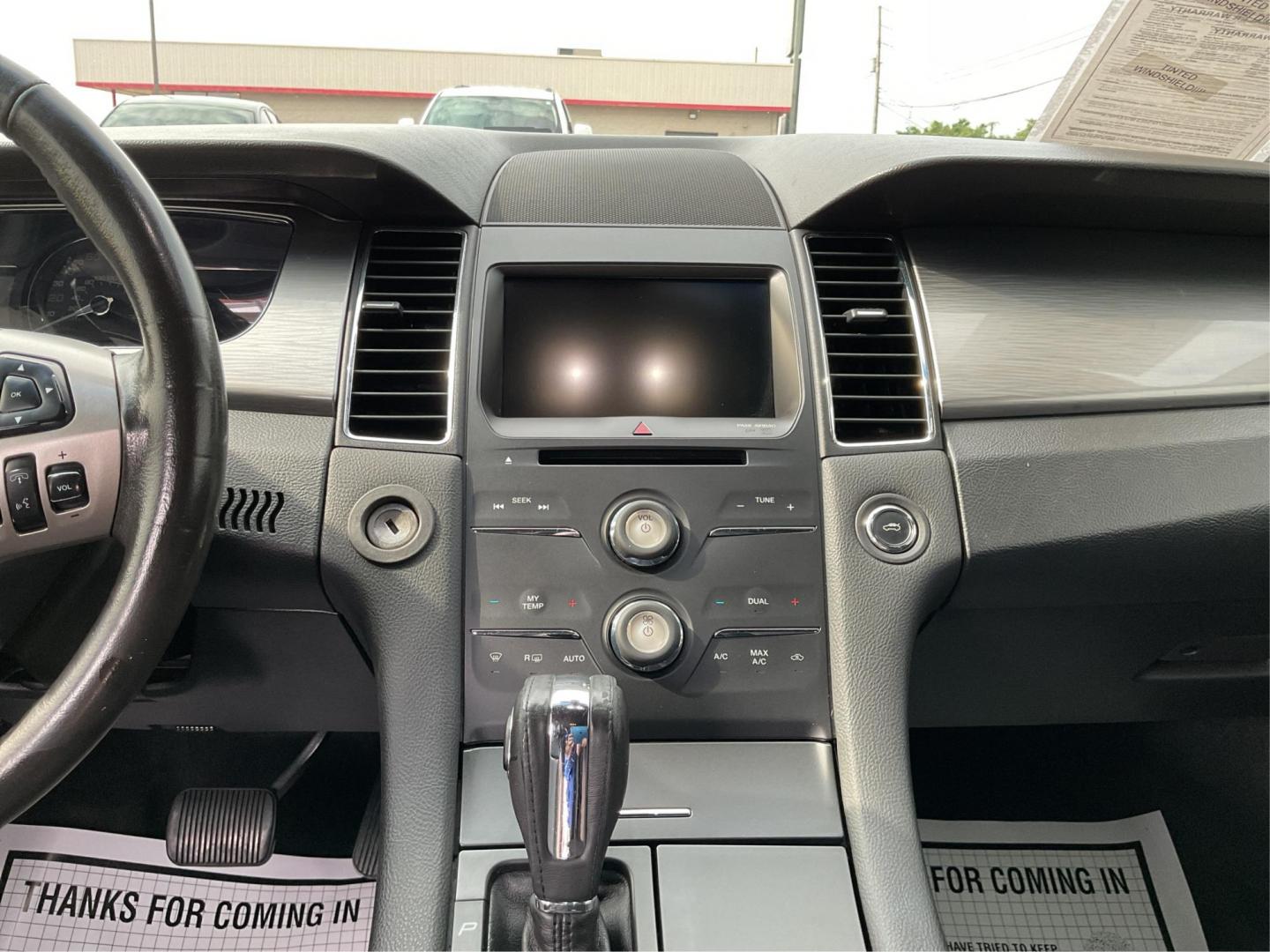 2014 Ford Taurus SEL (1FAHP2E86EG) with an EcoBoost 2L I-4 gasoline direct injection engine, located at 1099 N County Rd 25A , Troy, OH, 45373, (937) 908-9800, 40.057041, -84.215462 - Photo#13