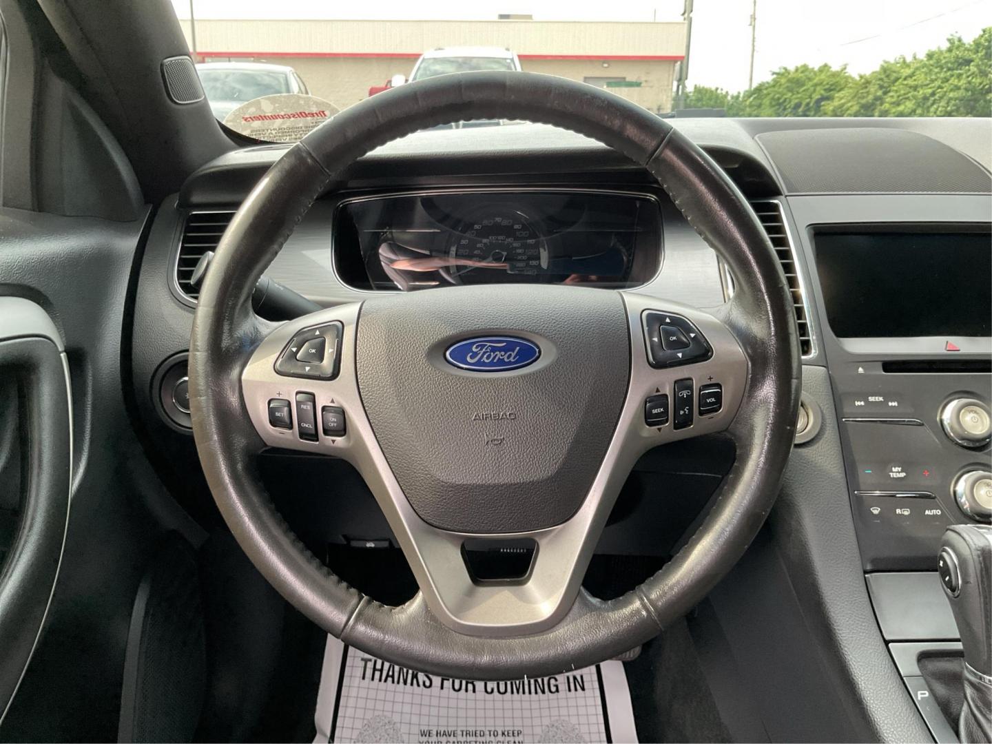 2014 Ford Taurus SEL (1FAHP2E86EG) with an EcoBoost 2L I-4 gasoline direct injection engine, located at 1099 N County Rd 25A , Troy, OH, 45373, (937) 908-9800, 40.057041, -84.215462 - Photo#16