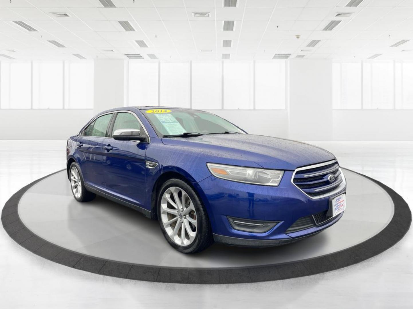 2014 Deep Impact Blue Metallic Ford Taurus Limited AWD (1FAHP2J86EG) with an 3.5L V6 DOHC 24V engine, 6-Speed Automatic transmission, located at 4508 South Dixie Dr, Moraine, OH, 45439, (937) 908-9800, 39.807072, -84.031563 - Photo#0