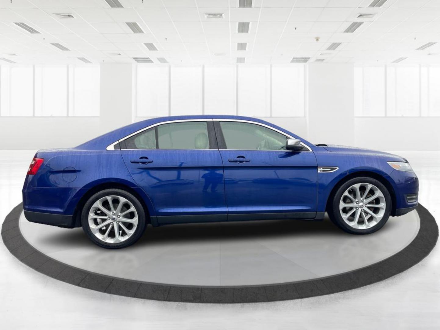 2014 Deep Impact Blue Metallic Ford Taurus Limited AWD (1FAHP2J86EG) with an 3.5L V6 DOHC 24V engine, 6-Speed Automatic transmission, located at 4508 South Dixie Dr, Moraine, OH, 45439, (937) 908-9800, 39.807072, -84.031563 - Photo#1