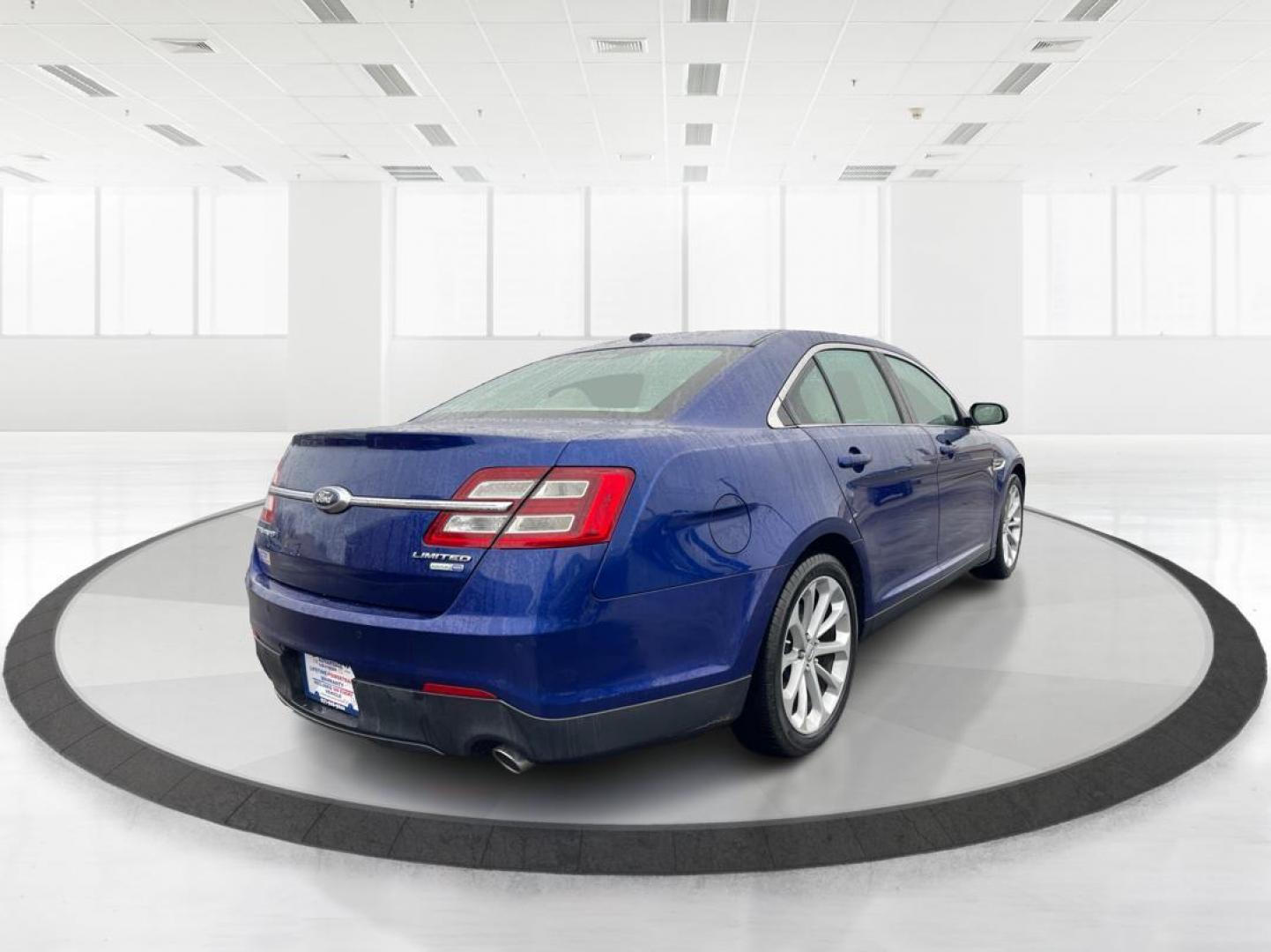 2014 Deep Impact Blue Metallic Ford Taurus Limited AWD (1FAHP2J86EG) with an 3.5L V6 DOHC 24V engine, 6-Speed Automatic transmission, located at 4508 South Dixie Dr, Moraine, OH, 45439, (937) 908-9800, 39.807072, -84.031563 - Photo#2