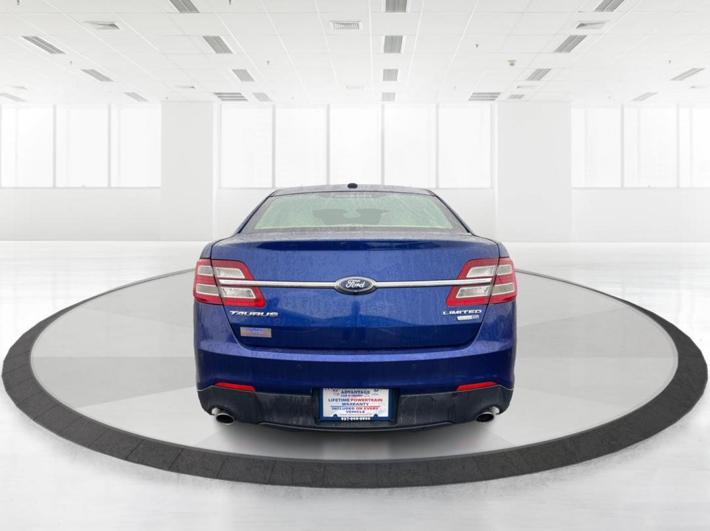 2014 Deep Impact Blue Metallic Ford Taurus Limited AWD (1FAHP2J86EG) with an 3.5L V6 DOHC 24V engine, 6-Speed Automatic transmission, located at 4508 South Dixie Dr, Moraine, OH, 45439, (937) 908-9800, 39.807072, -84.031563 - Photo#3