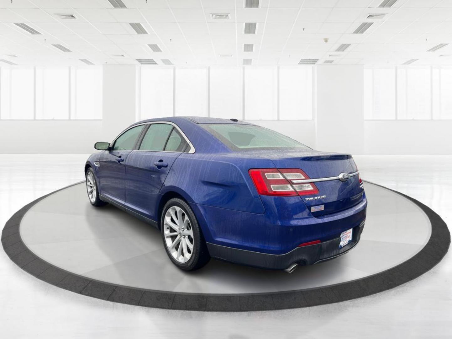 2014 Deep Impact Blue Metallic Ford Taurus Limited AWD (1FAHP2J86EG) with an 3.5L V6 DOHC 24V engine, 6-Speed Automatic transmission, located at 4508 South Dixie Dr, Moraine, OH, 45439, (937) 908-9800, 39.807072, -84.031563 - Photo#4