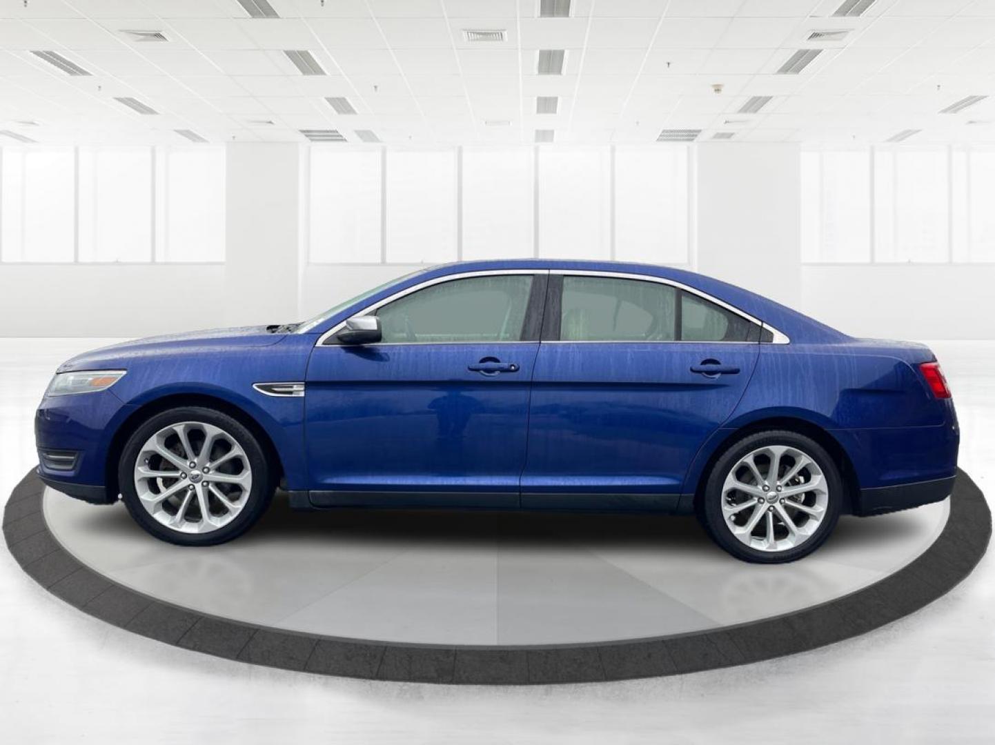 2014 Deep Impact Blue Metallic Ford Taurus Limited AWD (1FAHP2J86EG) with an 3.5L V6 DOHC 24V engine, 6-Speed Automatic transmission, located at 4508 South Dixie Dr, Moraine, OH, 45439, (937) 908-9800, 39.807072, -84.031563 - Photo#5