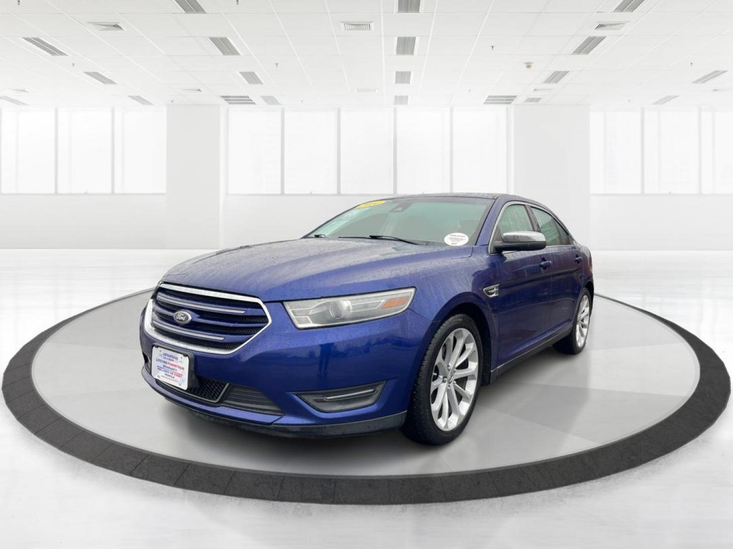 2014 Deep Impact Blue Metallic Ford Taurus Limited AWD (1FAHP2J86EG) with an 3.5L V6 DOHC 24V engine, 6-Speed Automatic transmission, located at 4508 South Dixie Dr, Moraine, OH, 45439, (937) 908-9800, 39.807072, -84.031563 - Photo#7