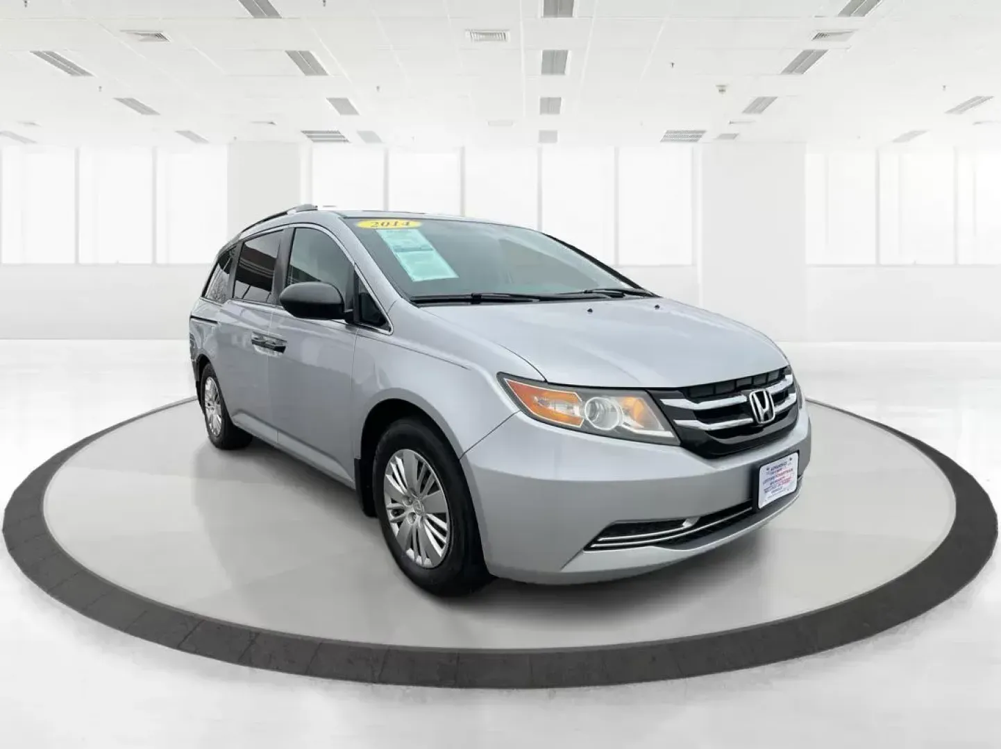 2014 Honda Odyssey LX (5FNRL5H23EB) with an 3.5L V-6 i-VTEC variable valve control engine, located at 880 E. National Road, OH, 45377, (937) 908-9800, 39.891918, -84.183975 - Photo#0
