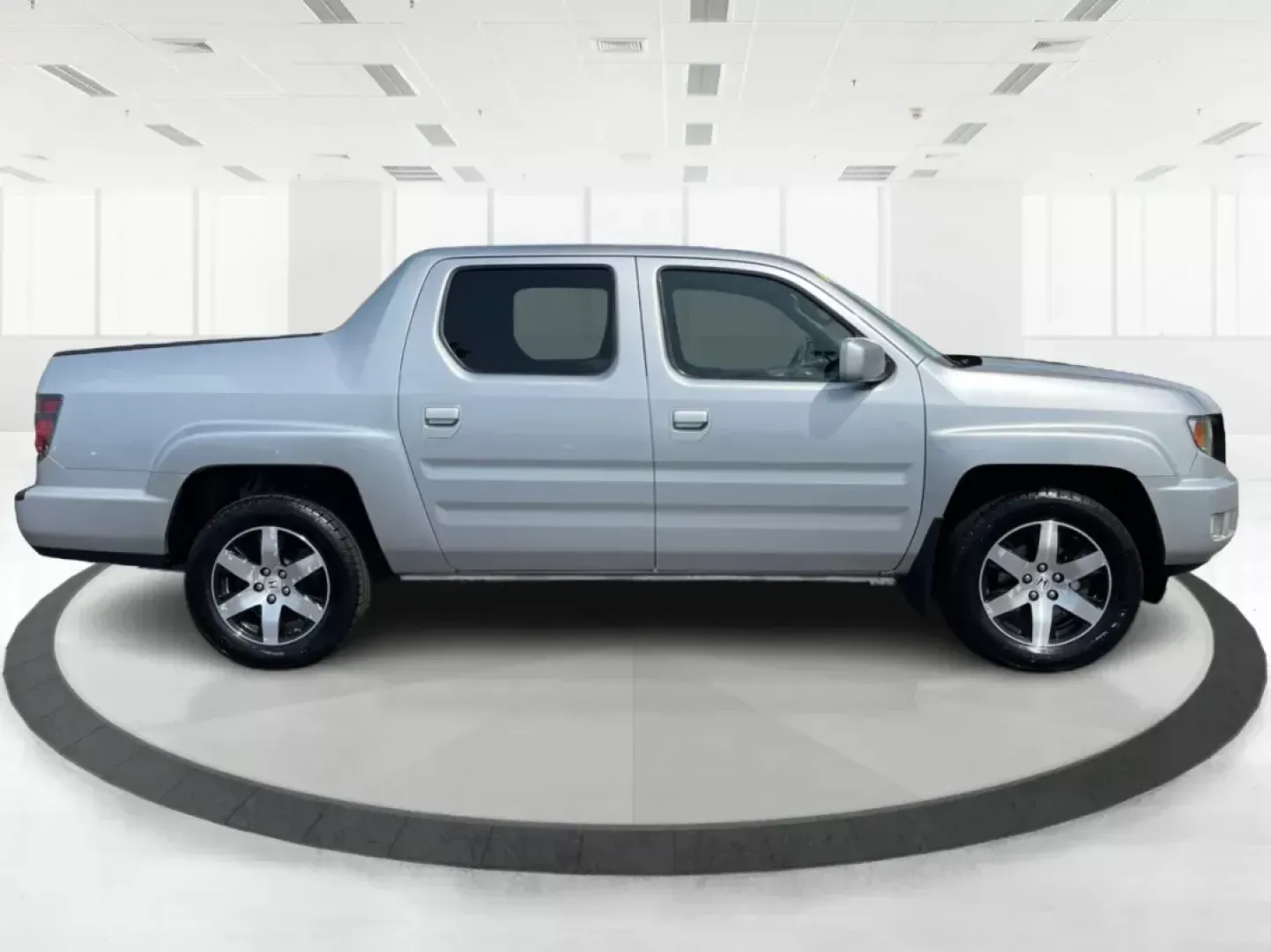 2014 Honda Ridgeline RTL-S (5FPYK1F67EB) with an 3.5L V6 SOHC 24V engine, 5-Speed Automatic transmission, located at 880 E. National Road, OH, 45377, (937) 908-9800, 39.891918, -84.183975 - Photo#0