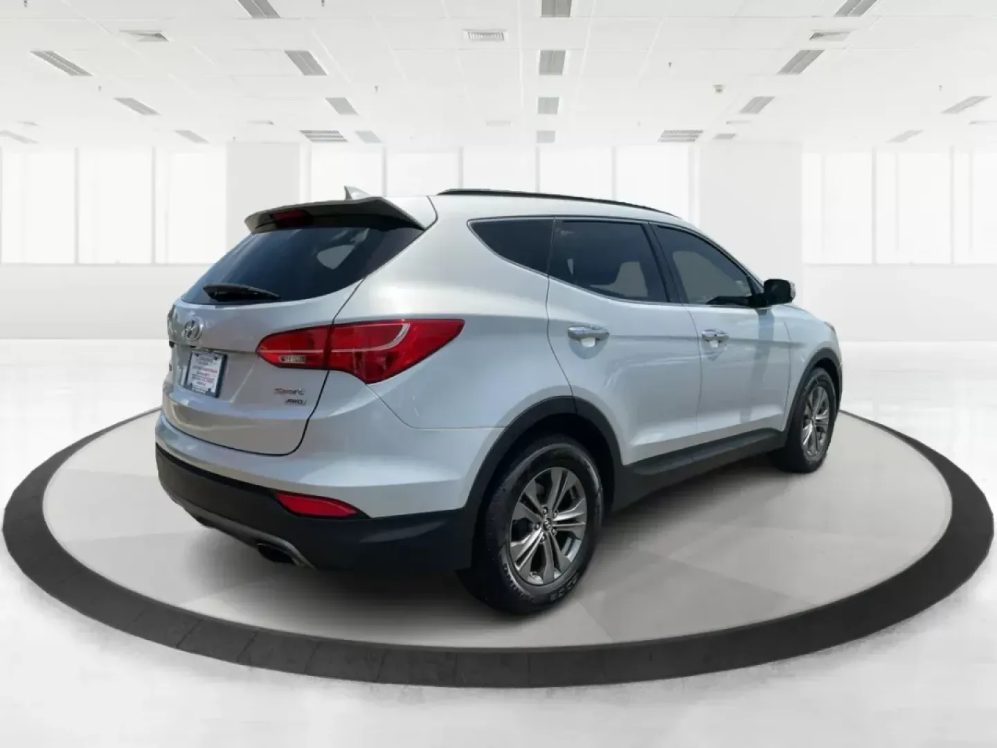 2014 Moonstone Silver Hyundai Santa Fe Sport 2.4 AWD (5XYZUDLB6EG) with an 2.4L L4 DOHC 16V engine, 6-Speed Automatic transmission, located at 8750 N County Rd 25A, Piqua, OH, 45356, (937) 908-9800, 40.164391, -84.232513 - Photo#2