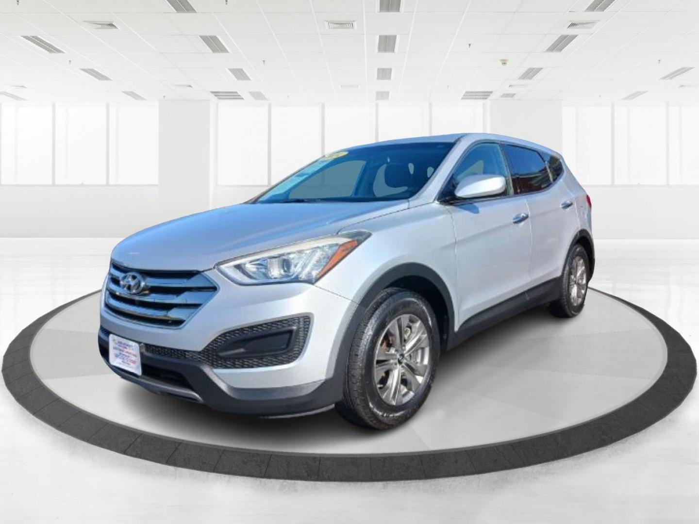 2014 Hyundai Santa Fe Sport 2.4 FWD (5XYZT3LB5EG) with an 2.4L L4 DOHC 16V engine, 6-Speed Automatic transmission, located at 1951 S Dayton Lakeview Rd., New Carlisle, OH, 45344, (937) 908-9800, 39.890999, -84.050255 - Photo#4