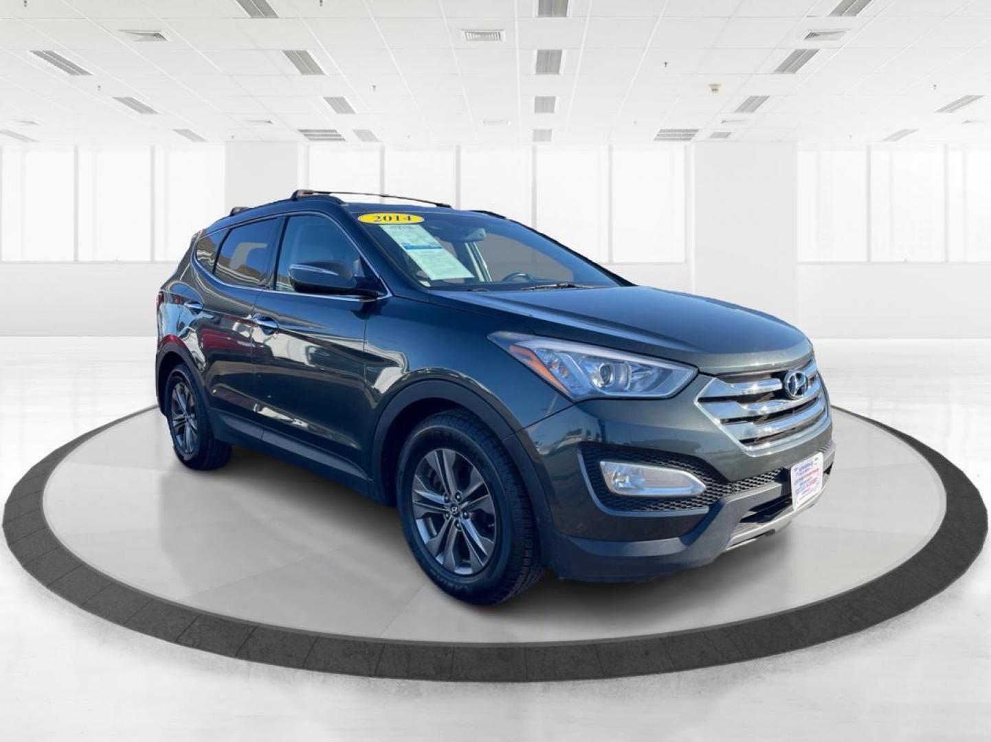 2014 Hyundai Santa Fe Sport 2.4 AWD (5XYZUDLB2EG) with an 2.4L L4 DOHC 16V engine, 6-Speed Automatic transmission, located at 1951 S Dayton Lakeview Rd., New Carlisle, OH, 45344, (937) 908-9800, 39.890999, -84.050255 - Photo#0