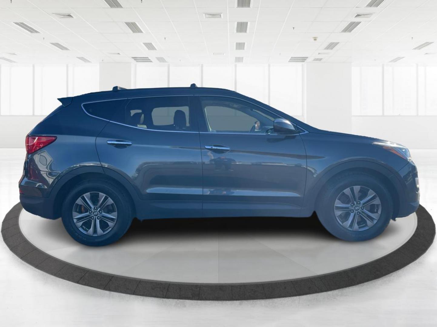 2014 Hyundai Santa Fe Sport 2.4 AWD (5XYZUDLB2EG) with an 2.4L L4 DOHC 16V engine, 6-Speed Automatic transmission, located at 1951 S Dayton Lakeview Rd., New Carlisle, OH, 45344, (937) 908-9800, 39.890999, -84.050255 - Photo#1