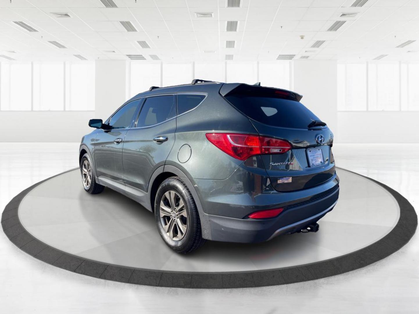 2014 Hyundai Santa Fe Sport 2.4 AWD (5XYZUDLB2EG) with an 2.4L L4 DOHC 16V engine, 6-Speed Automatic transmission, located at 1951 S Dayton Lakeview Rd., New Carlisle, OH, 45344, (937) 908-9800, 39.890999, -84.050255 - Photo#4
