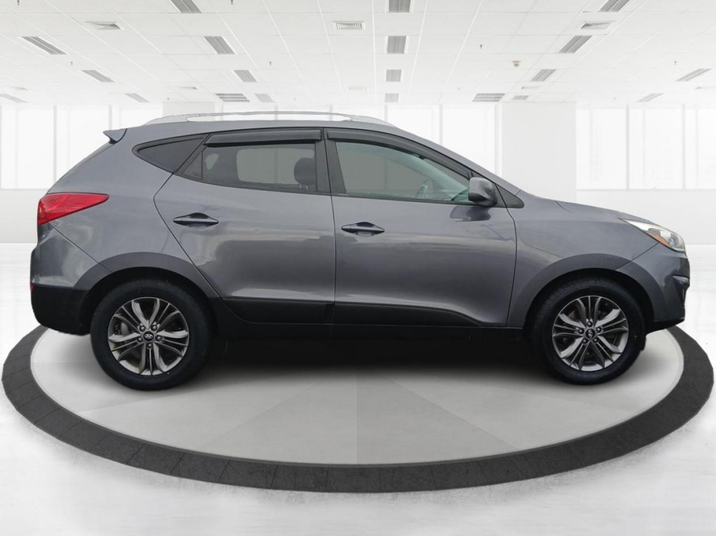 2014 Hyundai Tucson GLS AWD (KM8JUCAGXEU) with an 2.4L L4 DOHC 16V engine, 6-Speed Automatic transmission, located at 1951 S Dayton Lakeview Rd., New Carlisle, OH, 45344, (937) 908-9800, 39.890999, -84.050255 - Photo#1