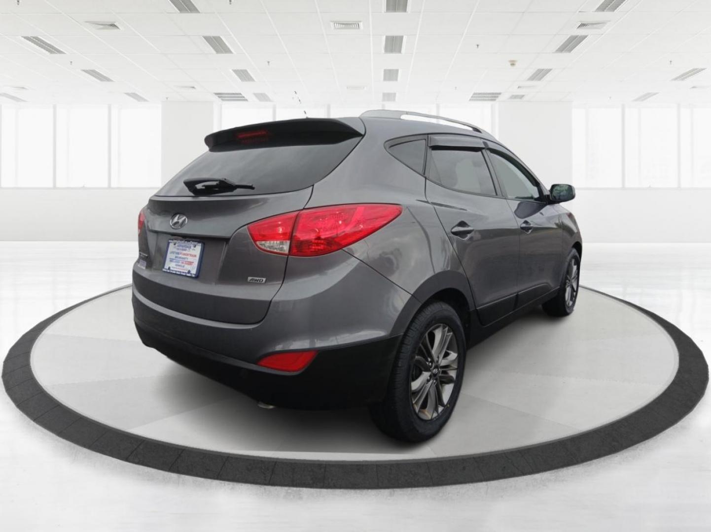 2014 Hyundai Tucson GLS AWD (KM8JUCAGXEU) with an 2.4L L4 DOHC 16V engine, 6-Speed Automatic transmission, located at 1951 S Dayton Lakeview Rd., New Carlisle, OH, 45344, (937) 908-9800, 39.890999, -84.050255 - Photo#2