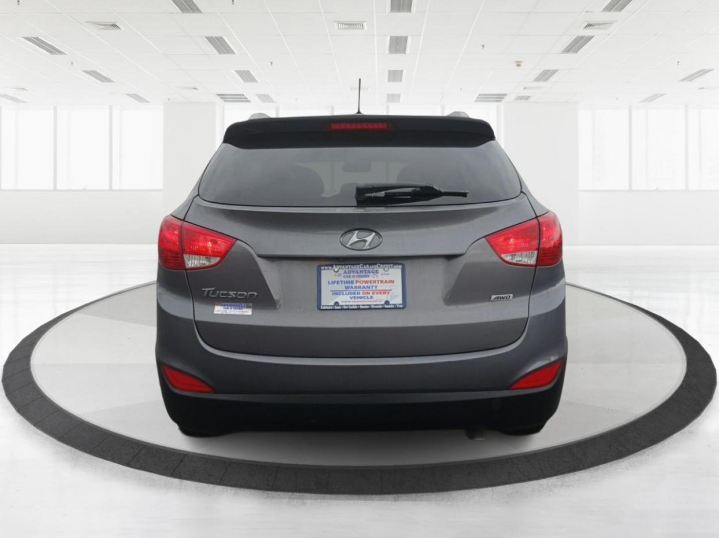 2014 Hyundai Tucson GLS AWD (KM8JUCAGXEU) with an 2.4L L4 DOHC 16V engine, 6-Speed Automatic transmission, located at 1951 S Dayton Lakeview Rd., New Carlisle, OH, 45344, (937) 908-9800, 39.890999, -84.050255 - Photo#3