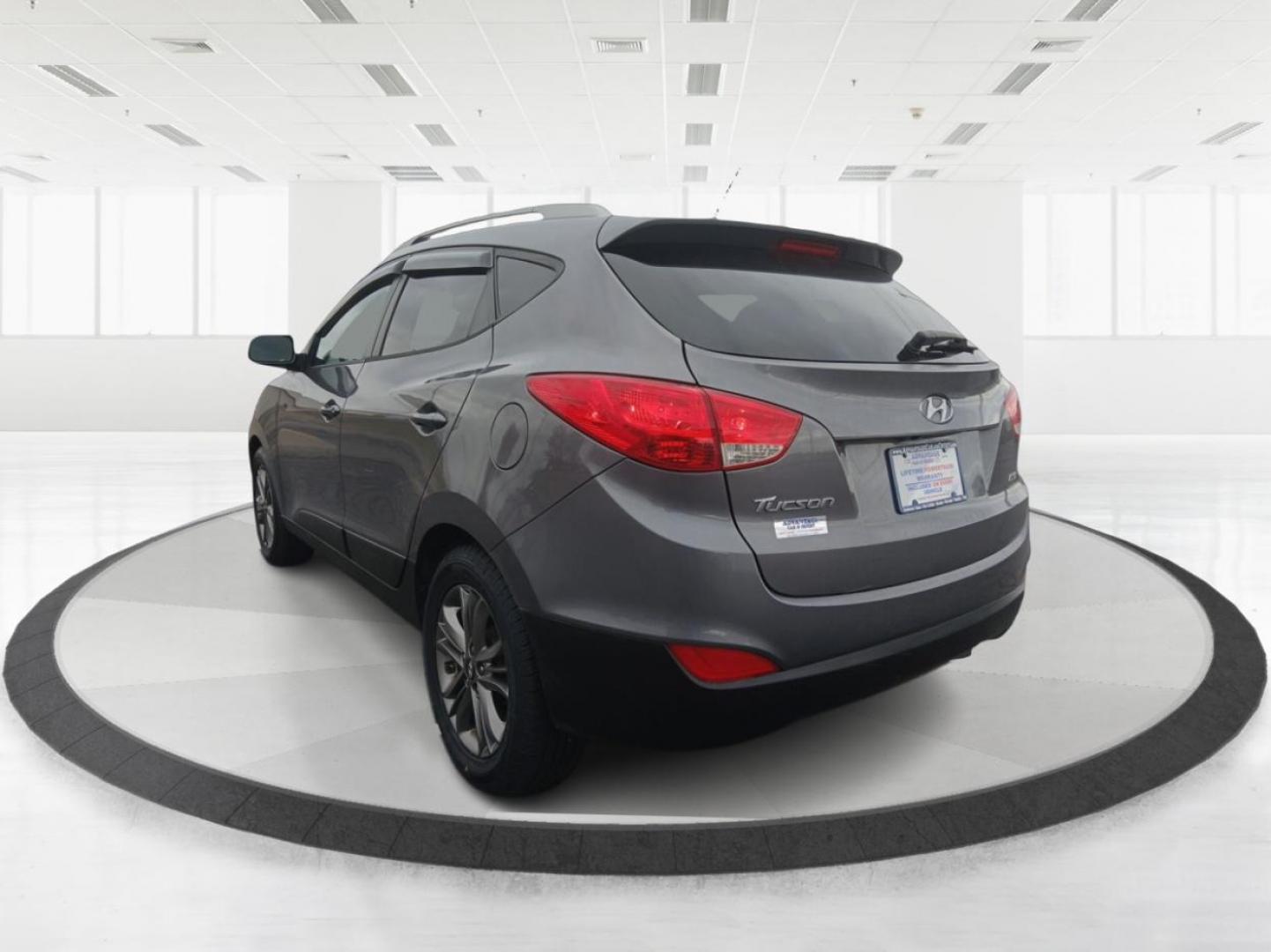 2014 Hyundai Tucson GLS AWD (KM8JUCAGXEU) with an 2.4L L4 DOHC 16V engine, 6-Speed Automatic transmission, located at 1951 S Dayton Lakeview Rd., New Carlisle, OH, 45344, (937) 908-9800, 39.890999, -84.050255 - Photo#4