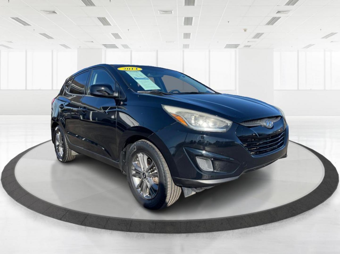 2014 Black Hyundai Tucson GL Auto AWD (KM8JTCAF0EU) with an 2.0L L4 DOHC 16V engine, 6-Speed Automatic transmission, located at 880 E. National Road, OH, 45377, (937) 908-9800, 39.891918, -84.183975 - Photo#0