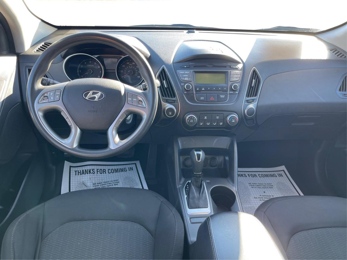 2014 Black Hyundai Tucson GL Auto AWD (KM8JTCAF0EU) with an 2.0L L4 DOHC 16V engine, 6-Speed Automatic transmission, located at 880 E. National Road, OH, 45377, (937) 908-9800, 39.891918, -84.183975 - Photo#20