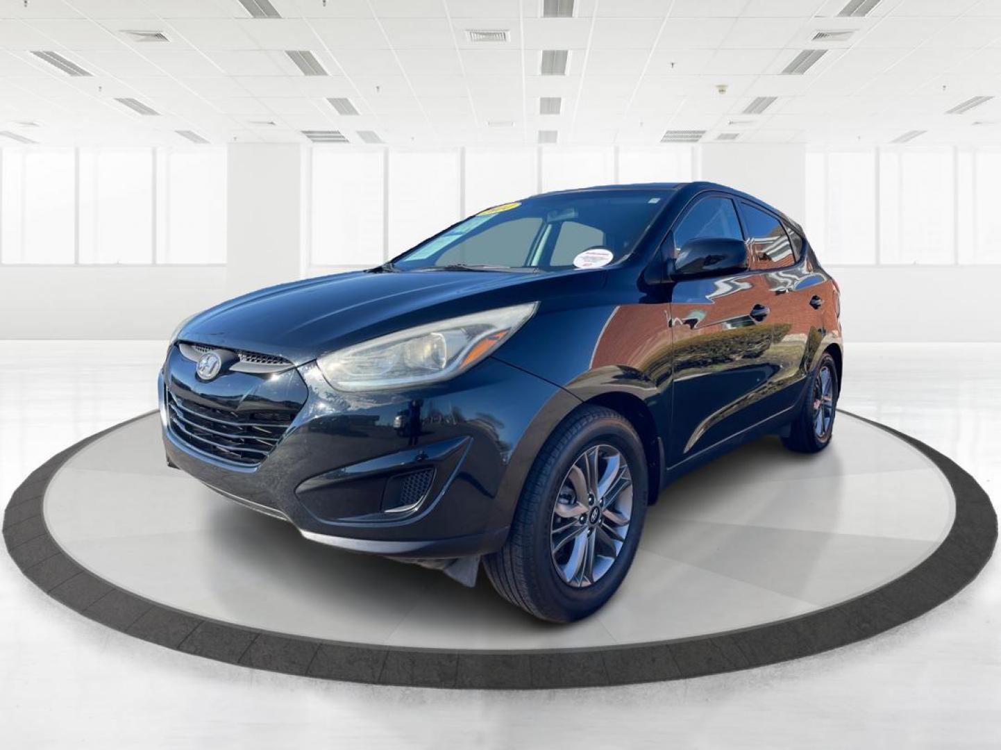 2014 Black Hyundai Tucson GL Auto AWD (KM8JTCAF0EU) with an 2.0L L4 DOHC 16V engine, 6-Speed Automatic transmission, located at 880 E. National Road, OH, 45377, (937) 908-9800, 39.891918, -84.183975 - Photo#7