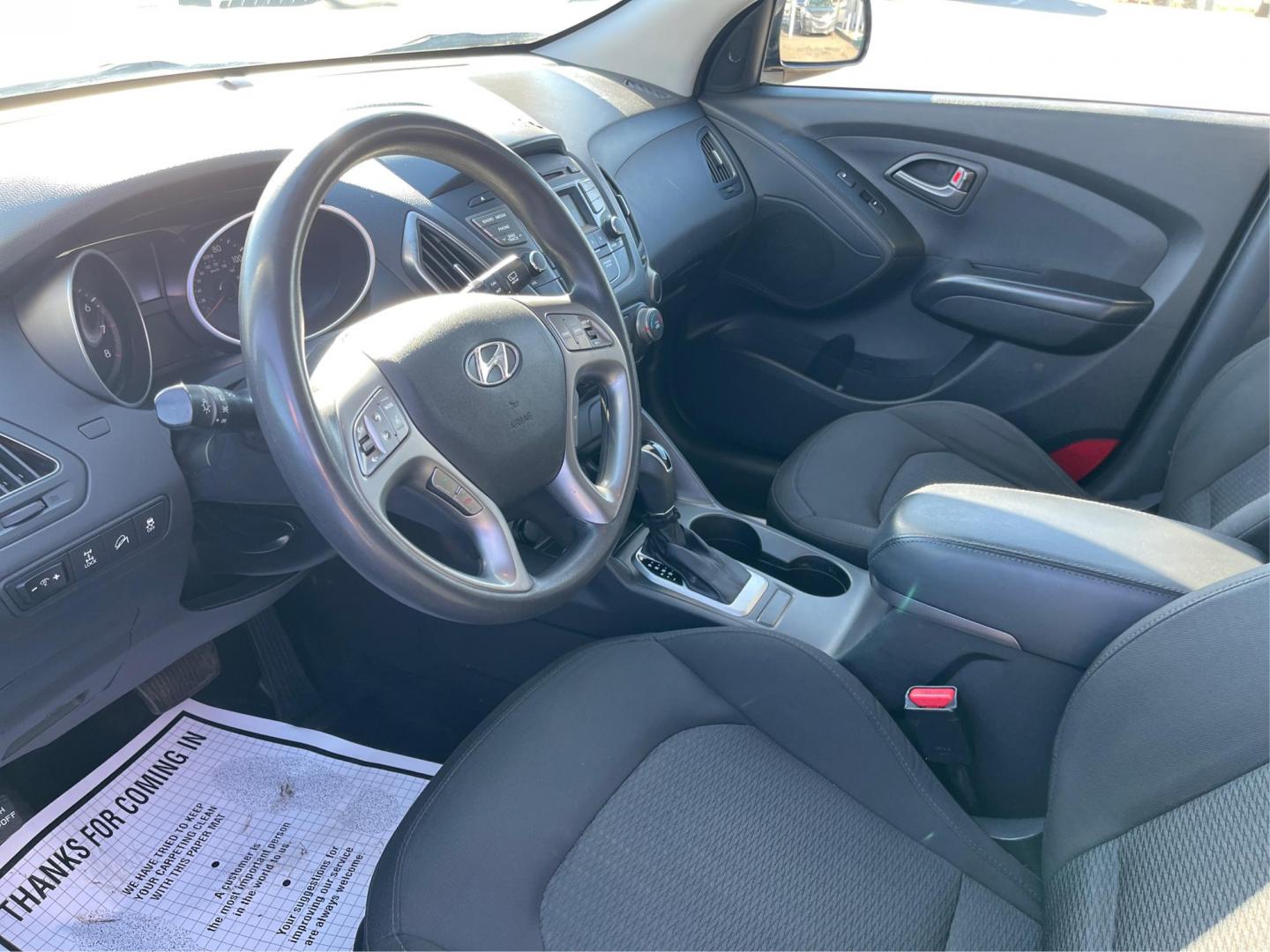 2014 Black Hyundai Tucson GL Auto AWD (KM8JTCAF0EU) with an 2.0L L4 DOHC 16V engine, 6-Speed Automatic transmission, located at 880 E. National Road, OH, 45377, (937) 908-9800, 39.891918, -84.183975 - Photo#8