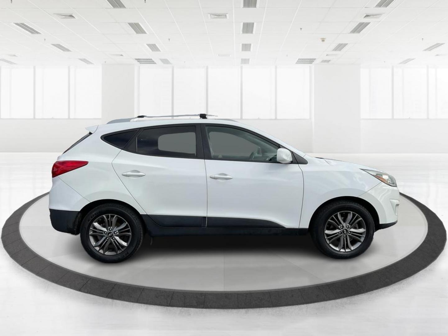 2014 Hyundai Tucson SE (KM8JU3AG0EU) with an Theta II 2.4L I-4 gasoline direct injection engine, located at 880 E. National Road, OH, 45377, (937) 908-9800, 39.891918, -84.183975 - Photo#1