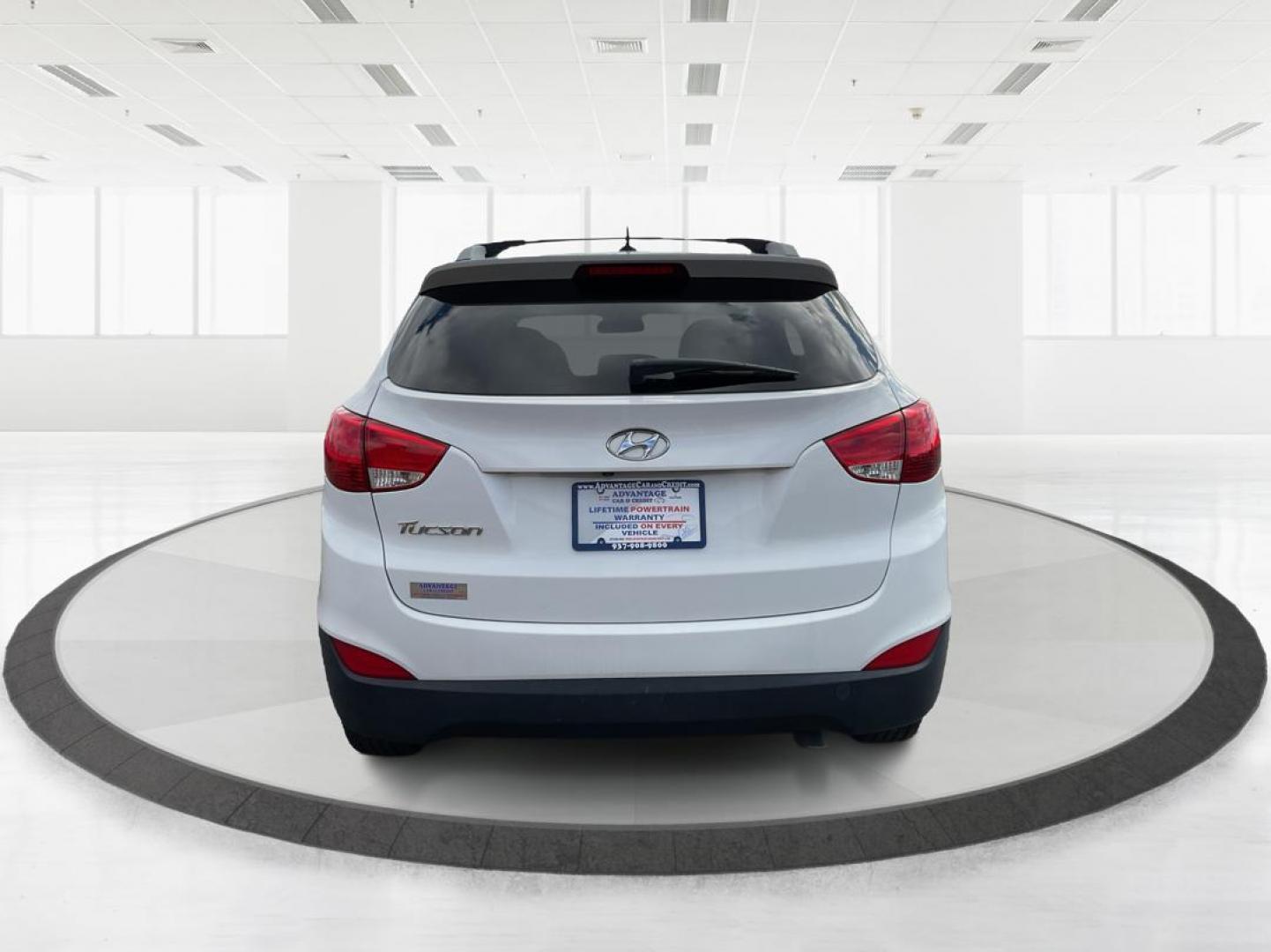 2014 Hyundai Tucson SE (KM8JU3AG0EU) with an Theta II 2.4L I-4 gasoline direct injection engine, located at 880 E. National Road, OH, 45377, (937) 908-9800, 39.891918, -84.183975 - Photo#2