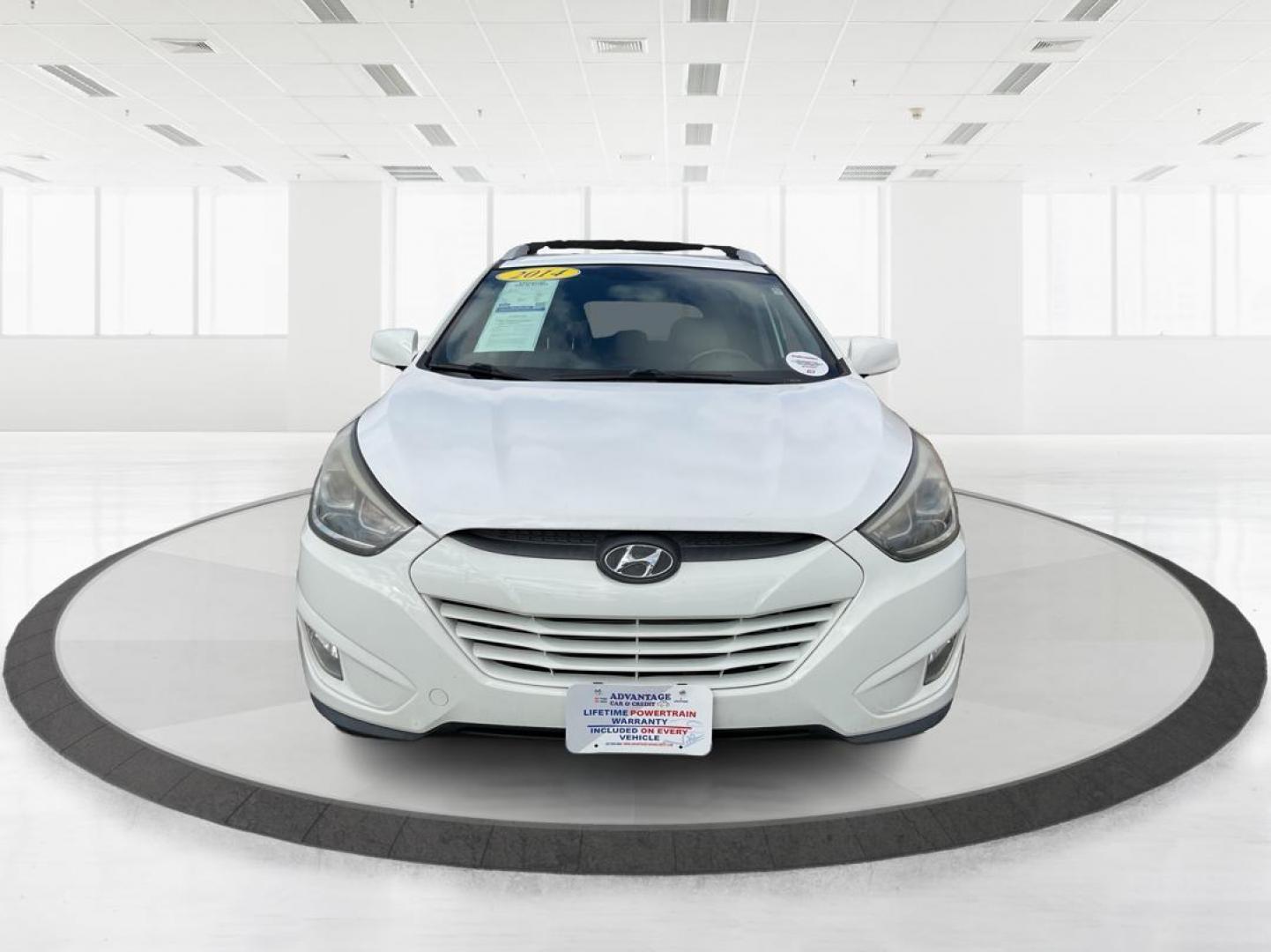 2014 Hyundai Tucson SE (KM8JU3AG0EU) with an Theta II 2.4L I-4 gasoline direct injection engine, located at 880 E. National Road, OH, 45377, (937) 908-9800, 39.891918, -84.183975 - Photo#4