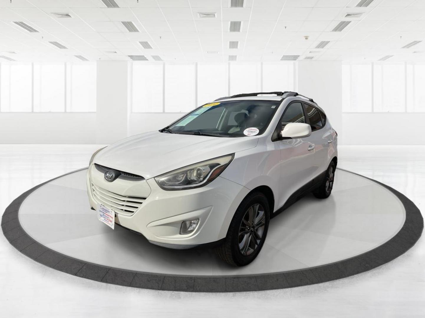 2014 Hyundai Tucson SE (KM8JU3AG0EU) with an Theta II 2.4L I-4 gasoline direct injection engine, located at 880 E. National Road, OH, 45377, (937) 908-9800, 39.891918, -84.183975 - Photo#5