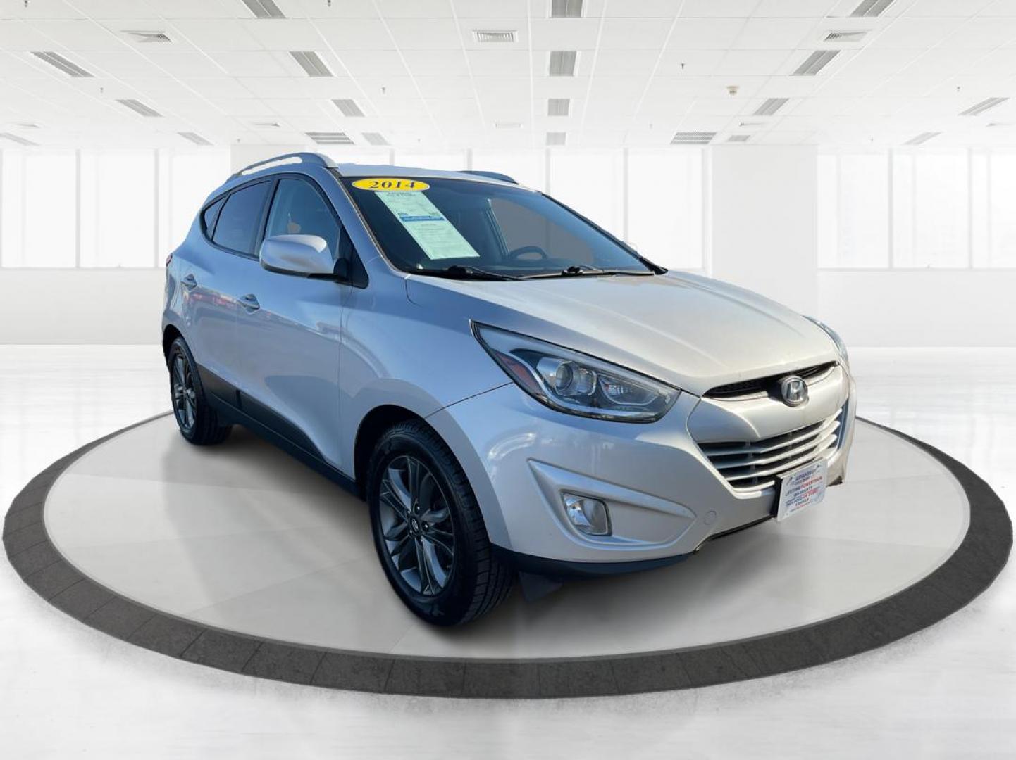 2014 Hyundai Tucson SE (KM8JUCAG8EU) with an Theta II 2.4L I-4 gasoline direct injection engine, located at 880 E. National Road, OH, 45377, (937) 908-9800, 39.891918, -84.183975 - Photo#0