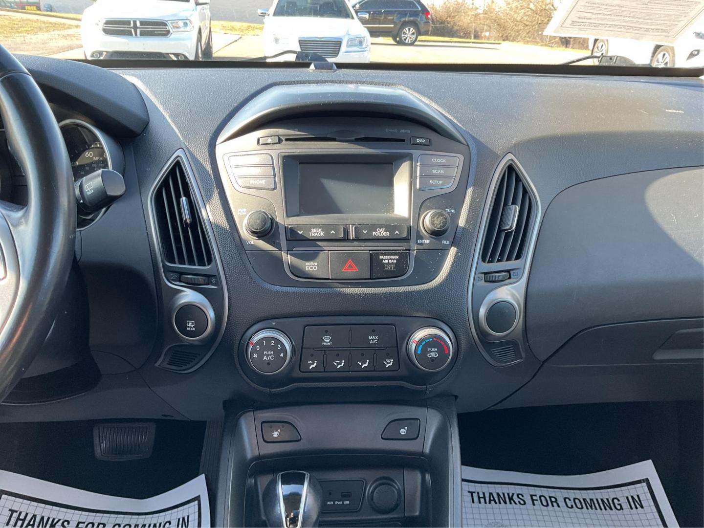 2014 Hyundai Tucson SE (KM8JUCAG8EU) with an Theta II 2.4L I-4 gasoline direct injection engine, located at 880 E. National Road, OH, 45377, (937) 908-9800, 39.891918, -84.183975 - Photo#12