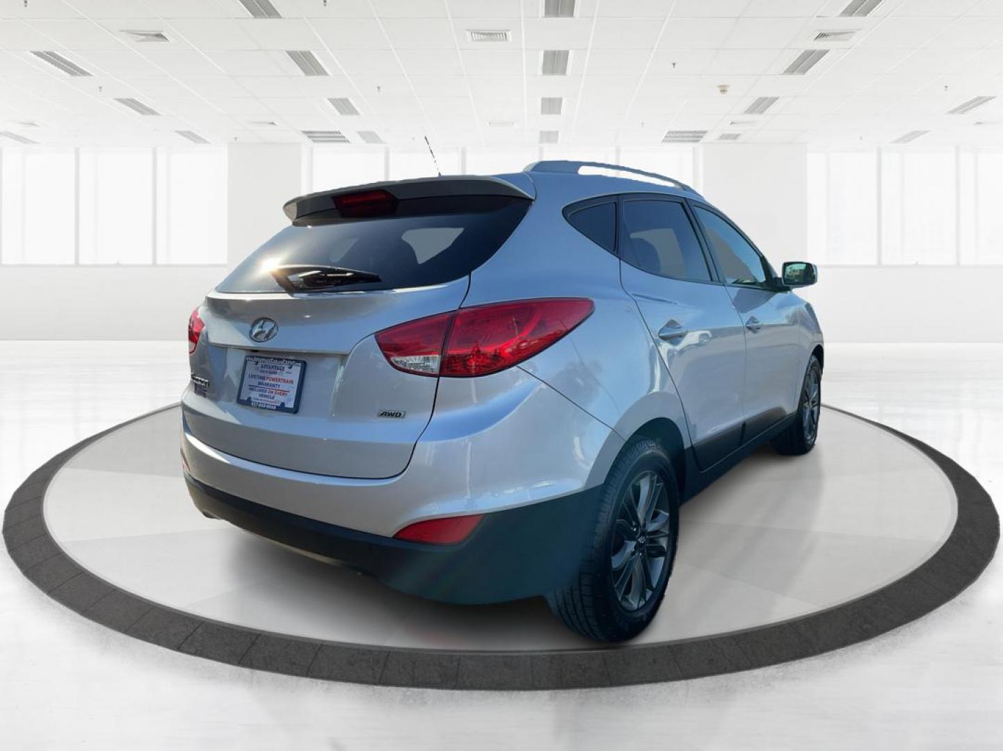 2014 Hyundai Tucson SE (KM8JUCAG8EU) with an Theta II 2.4L I-4 gasoline direct injection engine, located at 880 E. National Road, OH, 45377, (937) 908-9800, 39.891918, -84.183975 - Photo#2