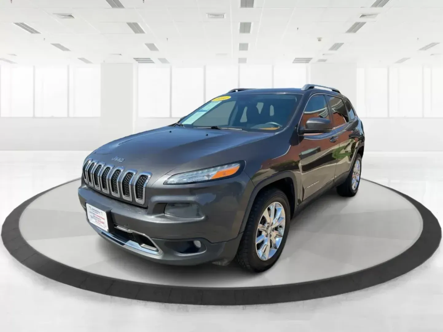 2014 Jeep Cherokee Limited 4WD (1C4PJMDBXEW) with an 2.4L L4 DOHC 16V engine, 9-Speed Automatic transmission, located at 1951 S Dayton Lakeview Rd., New Carlisle, OH, 45344, (937) 908-9800, 39.890999, -84.050255 - Photo#7
