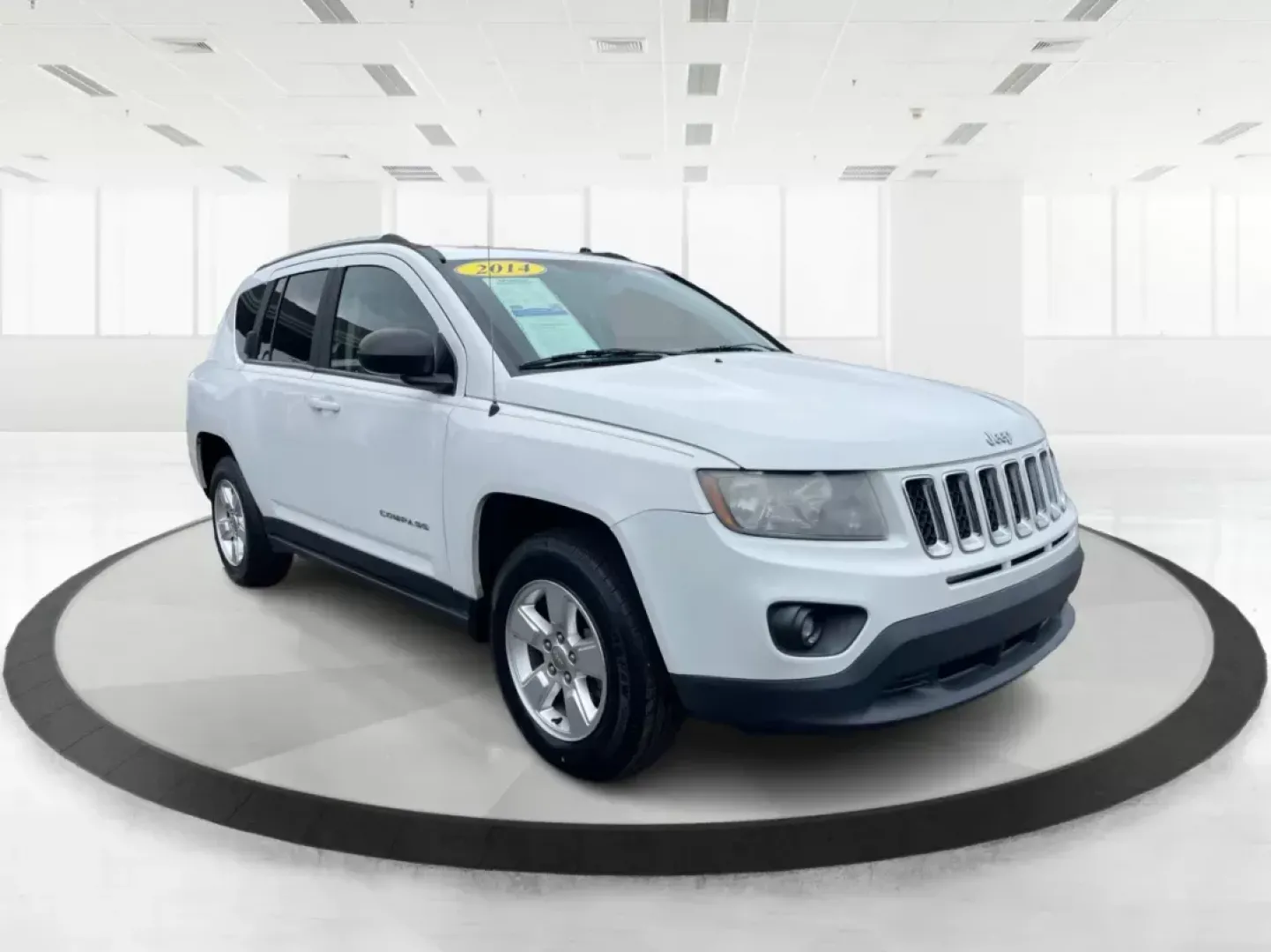 2014 Bright White Clearcoat Jeep Compass Sport FWD (1C4NJCBA9ED) with an 2.0L L4 DOHC 16V engine, located at 1951 S Dayton Lakeview Rd., New Carlisle, OH, 45344, (937) 908-9800, 39.890999, -84.050255 - Photo#0