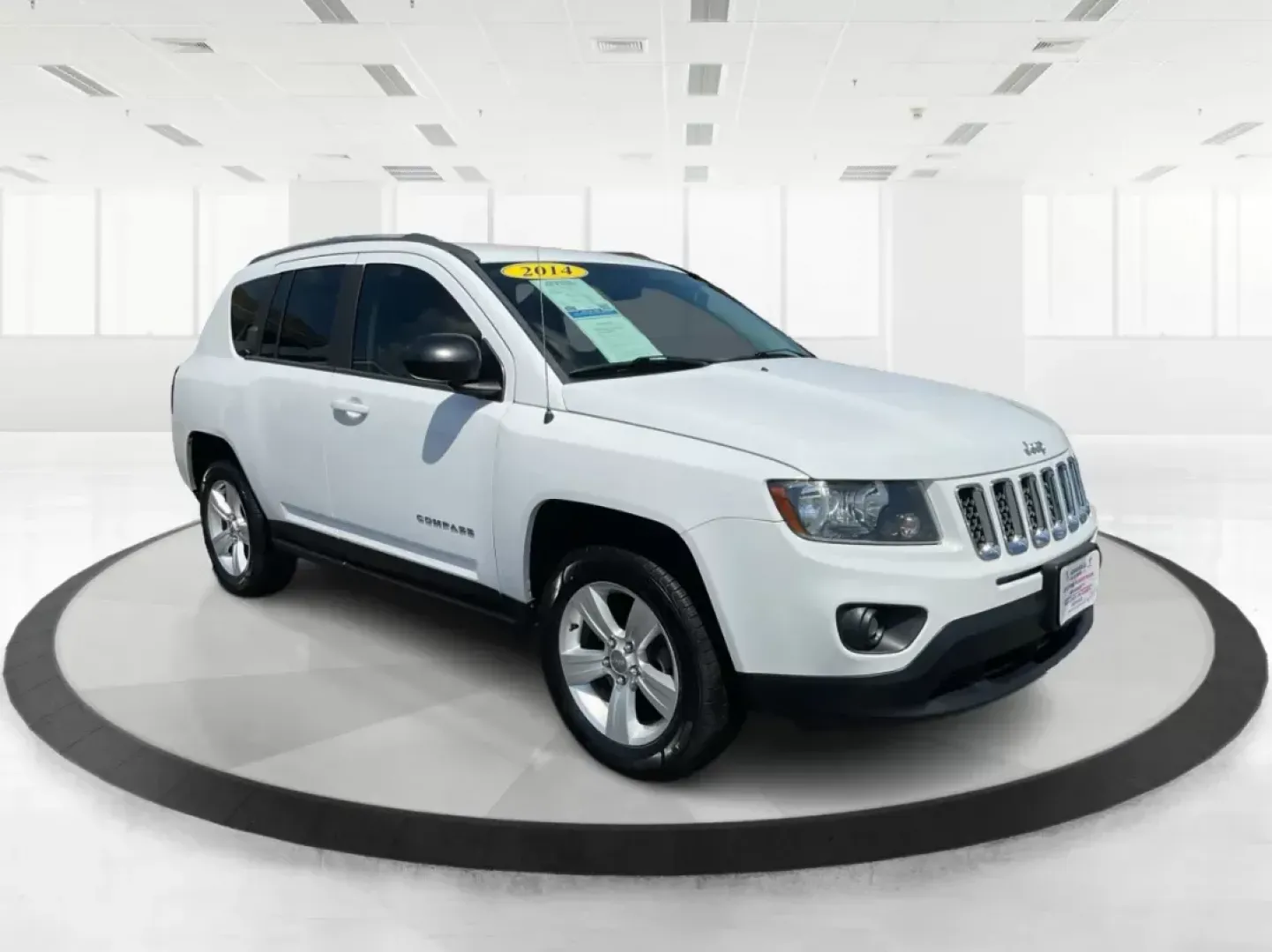 2014 Jeep Compass Sport (1C4NJDBB6ED) with an 2.4L I-4 DOHC engine, located at 401 Woodman Dr, Riverside, OH, 45431, (937) 908-9800, 39.761024, -84.120956 - Photo#0