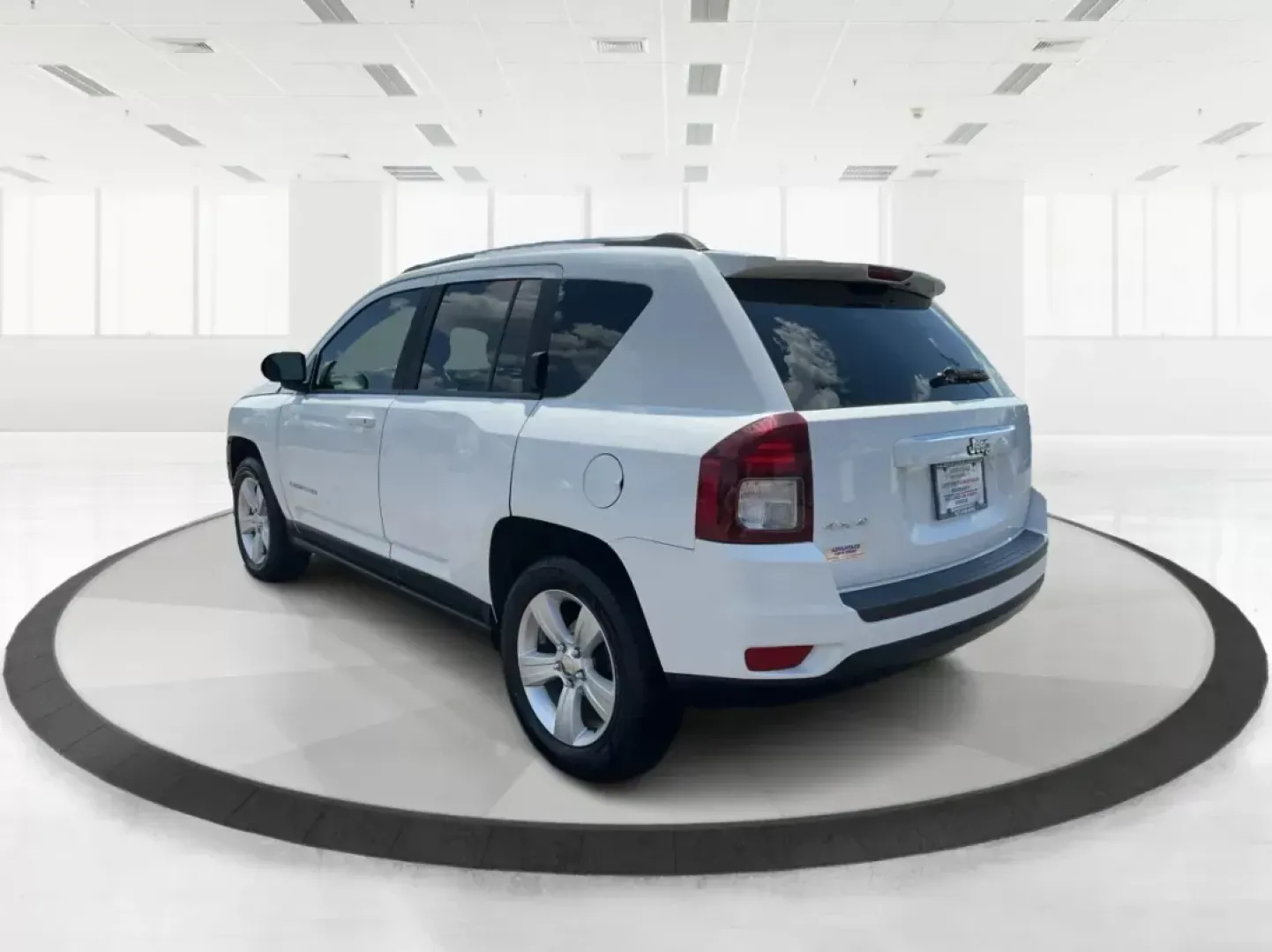 2014 Jeep Compass Sport (1C4NJDBB6ED) with an 2.4L I-4 DOHC engine, located at 401 Woodman Dr, Riverside, OH, 45431, (937) 908-9800, 39.761024, -84.120956 - Photo#4