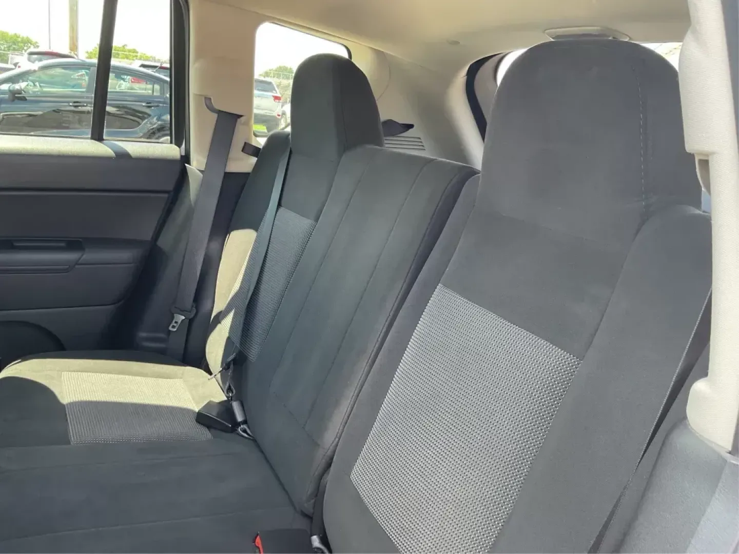 2014 Jeep Compass Sport (1C4NJDBB6ED) with an 2.4L I-4 DOHC engine, located at 401 Woodman Dr, Riverside, OH, 45431, (937) 908-9800, 39.761024, -84.120956 - Photo#9