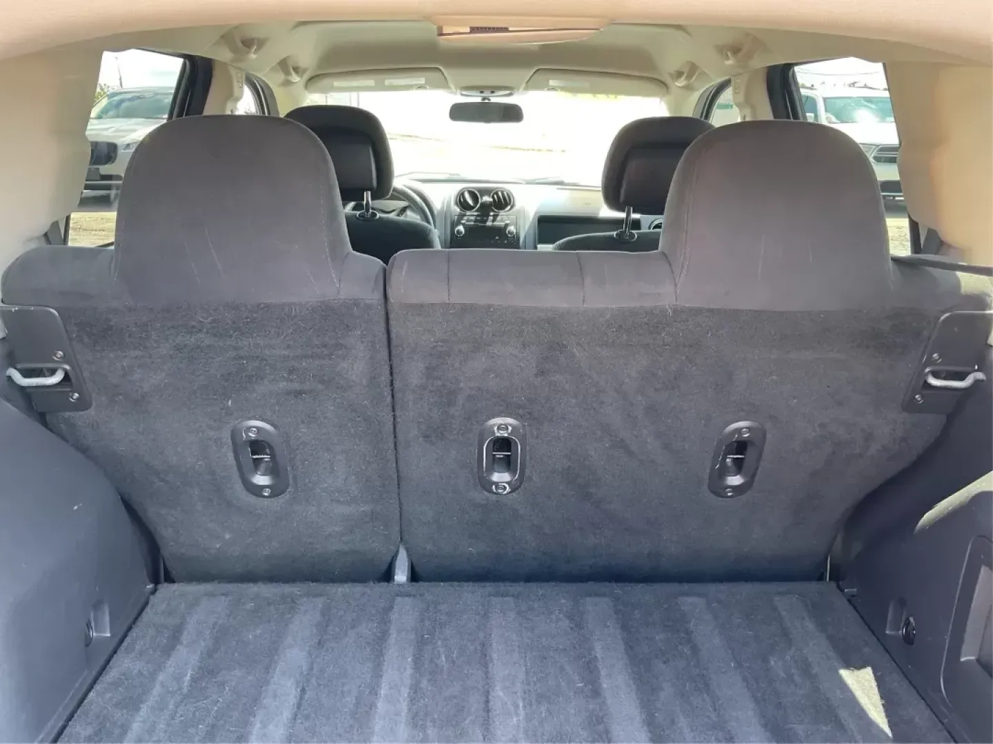 2014 Jeep Compass Sport (1C4NJDBB6ED) with an 2.4L I-4 DOHC engine, located at 401 Woodman Dr, Riverside, OH, 45431, (937) 908-9800, 39.761024, -84.120956 - Photo#11