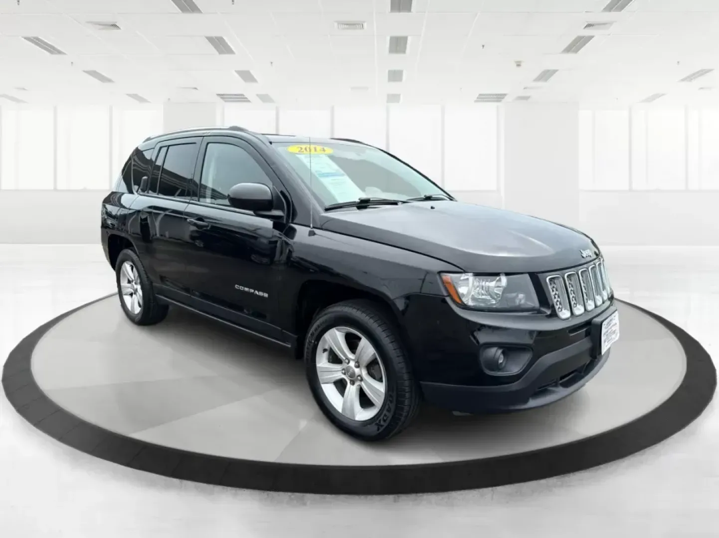 2014 Jeep Compass Latitude (1C4NJCEB4ED) with an Other engine, located at 1099 N County Rd 25A , Troy, OH, 45373, (937) 908-9800, 40.057041, -84.215462 - Photo#0