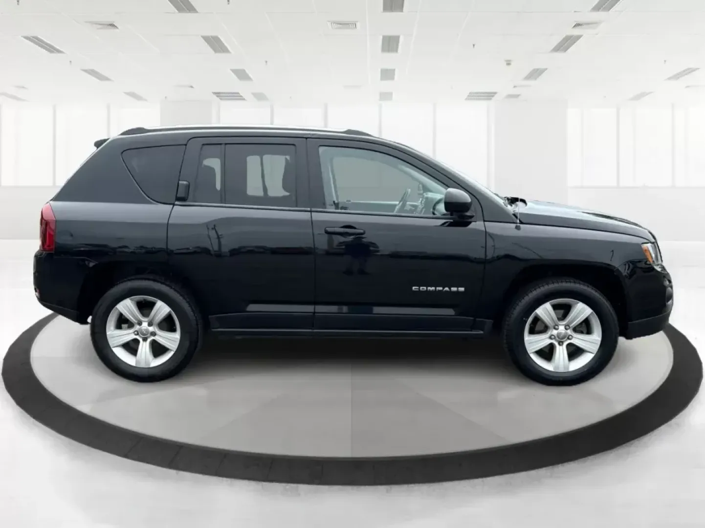 2014 Jeep Compass Latitude (1C4NJCEB4ED) with an Other engine, located at 1099 N County Rd 25A , Troy, OH, 45373, (937) 908-9800, 40.057041, -84.215462 - Photo#1